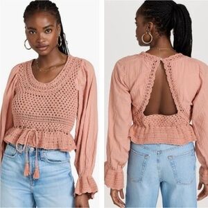 Free People Megan Long sleeves cut out back
Crochet crop Top size Large